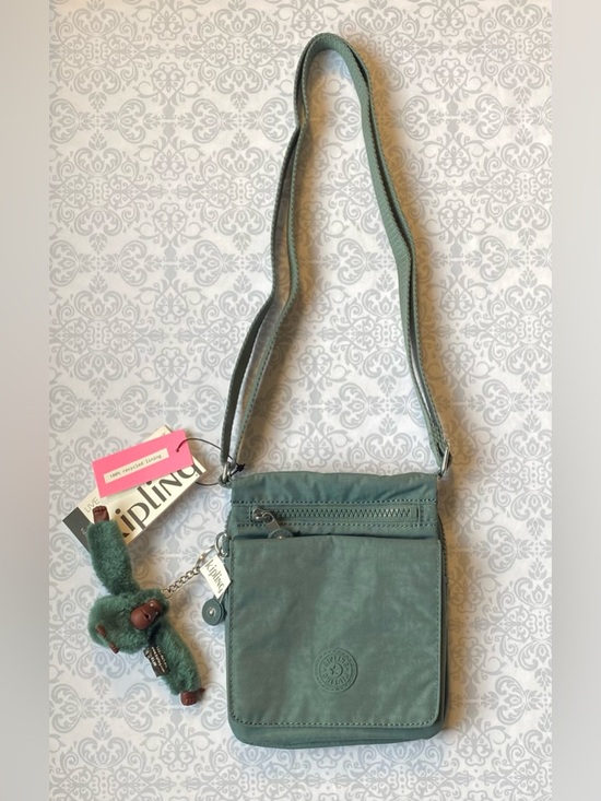 Kipling Handbags - NWT Kipling Compact Crossbody Bag with Adjustable Strap & Plush Monkey Keychain